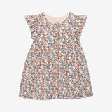 Newborn girls' springtime dress with snap buttons