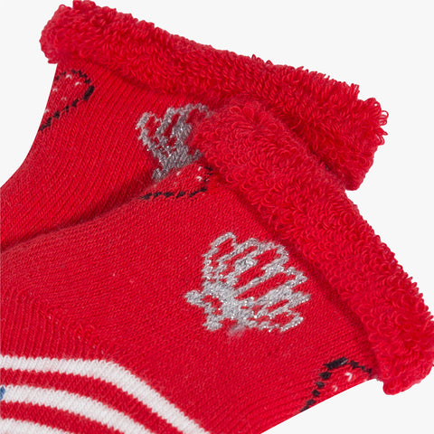 Newborn girl boucle socks with marine motifs