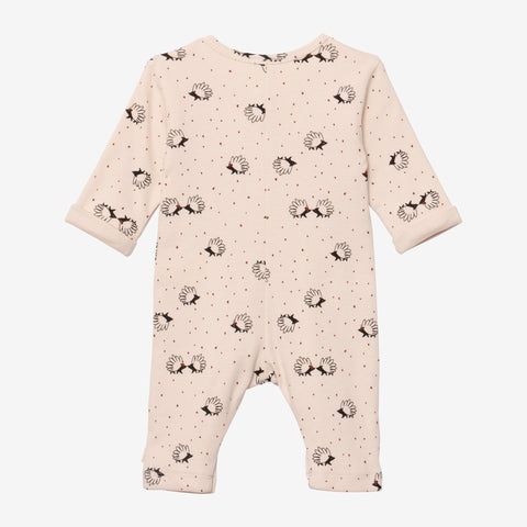 Newborn hedgehog and polka dots jumpsuit
