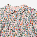 Newborn girls' springtime T-shirt with snap buttons